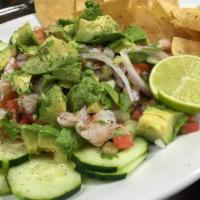 Ceviche de Camaron · Three shrimp tostadas cooked in lime- juice with onions, tomatoes, cucumbers, cilantro and a...