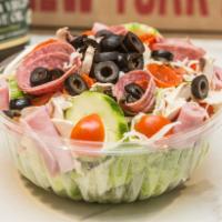 Antipasto Salad · Garden salad with ham, salami, mushrooms, black olives, and mozzarella.