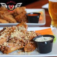 15 Pieces Grilled Wings · Healthy menu selections. Flame grilled then tossed in your choice of any specialty sauce.