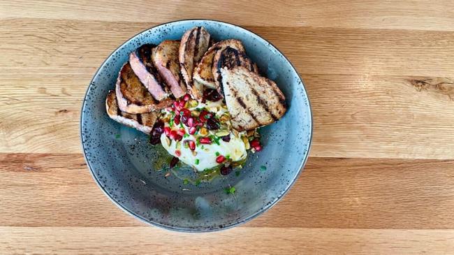 Whipped Feta Dip · Multigrain Toast, Pomegranate, Chives, Pistachios, Dried Cranberries, Honey & Extra Virgin Olive Oil (V)