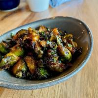 Roasted Brussels Sprouts · Applewood Smoked Bacon, Fried Capers,
Brown Sugar & Onions