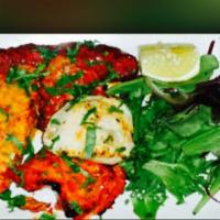 Combination Platter · Chicken malai kebab, chicken tikka, barrah kebab, and fish tikka.