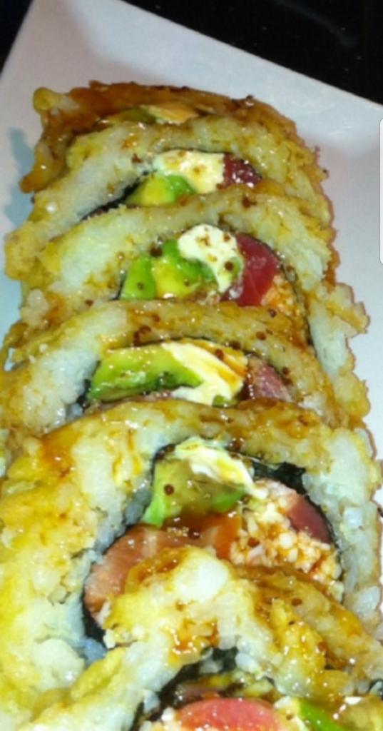 Las Vegas Roll · 3 kind of deep fried fish, crab, cream cheese, avocado with house sauce & eel sauce.