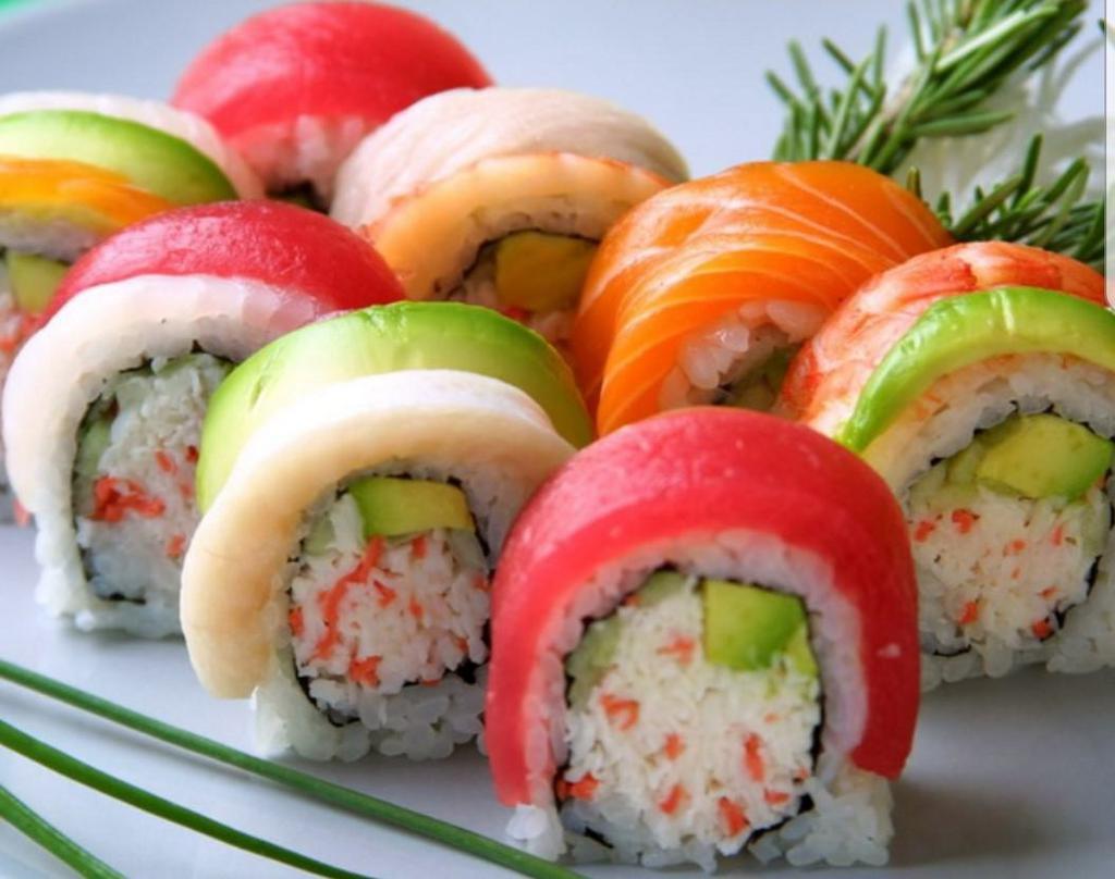 Rainbow Roll · Crab, avocado. Steam shrimp. with fresh fish on top with house sauce.