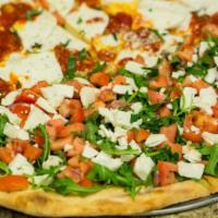 Arugula Bruschetta and Fresh Mozzarella Pizza Special · Fresh basil, tomatoes, and onions.