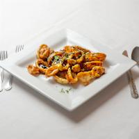 Calamari Fritti · Fried Calamari tossed in an agrodolce sauce with a red cabbage apple slow