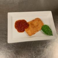Mozzarella in Carrozza · Mozzarella, coated in our special batter, fried golden brown with house-made marinara sauce.