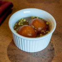 Gulab Jamun (3 Pcs) · Homemade soft milk balls dipped in honey syrup served warm.