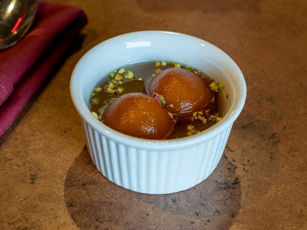 Gulab Jamun (3 Pcs) · Homemade soft milk balls dipped in honey syrup served warm.