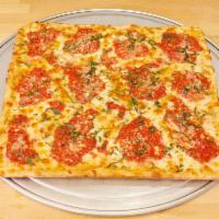 Grandma's Pizza · Square, thin crust with plum tomato sauce. Mozzarella cheese, fresh basil, and extra virgin ...