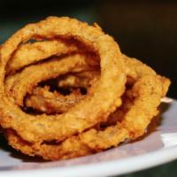 Onion Rings · Served with Lucky's white BBQ.