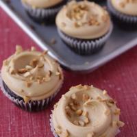 Choco/PB Cupcake · A rich classic chocolate cupcake topped with peanut butter buttercream and garnished with cr...