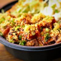 Crunchy-Spicy Poke · Diced fresh ahi, spicy aioli, mild chili, soy sauce, spices, crispy flakes, onions. toasted ...