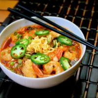 Kim Chi Seafood Soup · An original. Tutu 's comfort soup, beef, seafood, kim chi. 