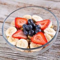 PH Greek Yogurt · Greek yogurt topped with strawberries, blueberries, banana, granola and honey.