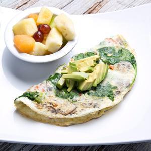 Shredded Veggie Omelette · Six egg whites, red peppers, red onions, spinach, broccoli, tomatoes, zucchini, asparagus, mushrooms, avocado, served with side of fruit.