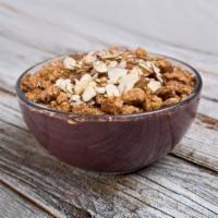Acai Nutty Butter Bowl · Organic unsweetened acai, chocolate whey, soy milk, peanut butter, agave, topped with almond...