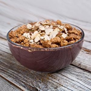 Acai Nutty Butter Bowl · Organic unsweetened acai, chocolate whey, soy milk, peanut butter, agave, topped with almonds, granola and flax seeds.
