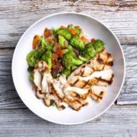 Cajun BBQ Bowl · Grilled hormone-free, cage-free Cajun chicken, broccoli, green onions, red peppers, red onio...
