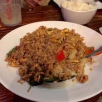 Spicy Fried Rice · Bell pepper, onions, basil leaves and chili.