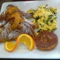 Peach Cobbler French Toast · Four Slices of French Toast Topped with Peach Cobble Peaches your choice bacon or sausage & ...