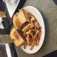 Meatloaf Sandwich · Home style meatloaf in our own brown gravy or house mayo with lettuce, tomato, pickle served...