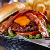 Brown Sugar and Smoked Cheddar Burger · House made cinnamon brown sugar bacon combined with smoked cheddar cheese, pabst onions and ...
