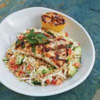 Grilled Mahi Mahi Salad · Quinoa, green cabbage, cucumbers, marinated artichokes, mixed olives, tomatoes, tossed with ...