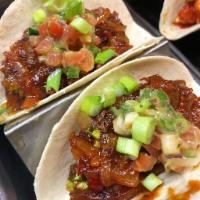 BBQ Short Rib Taco · short rib, BBQ sauce, caramelized onions, avocado salsa (3 tacos)