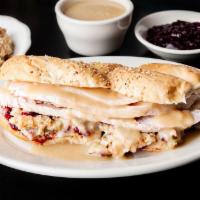 Plymouth Rock Sandwich · Turkey, stuffing, cranberry, and mayo on a braided roll.  This is a cold sandwich. Served wi...