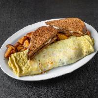 Meat Lovers Omelette · Bacon, ham, sausage, and cheddar cheese.  All omelettes are served with homefries and toast 