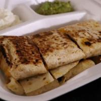 Chicken Quesadilla · Serve with guacamole and sour cream 
