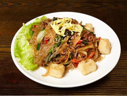 A10. Jap Chae · Served with with beef or without beef. Pan-fried vermicelli noodles with assorted vegetables, beef, mushroom and tofu.