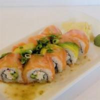 Salmon Yuzu Roll · California Roll topped with Salmon, Avocado, Green Onions, and Yuzu Sauce