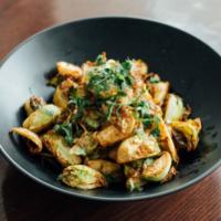 Brussels Sprouts · Brussels sprouts sauteed and tossed in spices. Vegan.