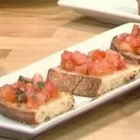 Bruschette · Toasted homemade bread topped with with evoo, tomatoes, garlic, oregano and fresh basil.