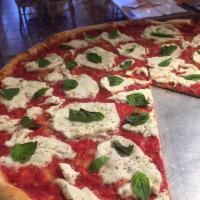 12in Margherita Pizza · Fresh mozzarella, tomato sauce and fresh basil.
