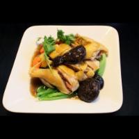 Com Ga Hap Cải Be Xanh An Nam · Chicken with mustard greens, shiitake mushrooms, & sauce over rice