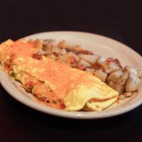 Classic Breakfast · Includes 2 eggs, hash browns or home fries, toast or flavored pancakes and choice of the meat.