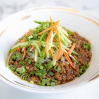 N8. Zha Jiang Noodles · Hand-pulled noodles topped with sliced cucumber, ground pork, green onions in soybean paste.