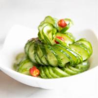 A1. Marinated Cucumber Salad · Freshly-cut cucumber blended with vinegar, mustard and diced red peppers. Vegetarian.