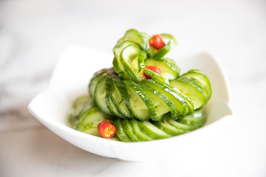 A1. Marinated Cucumber Salad · Freshly-cut cucumber blended with vinegar, mustard and diced red peppers. Vegetarian.