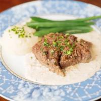 Filet Mignon · Our amazing filet mignon served with our signature and unmistakable garlic cream sauce, mash...