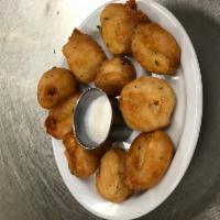 Fried Pickles · Fried in Scratch-Made Beer Batter.Served with Ranch Dipping sauce.