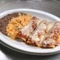 Bertha's Enchiladas · Shredded mozzarella cheese, house made red sauce, accompanied by rice & beans.