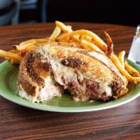 Reuben · House cured corned beef, kraut and Thousand Island dressing.