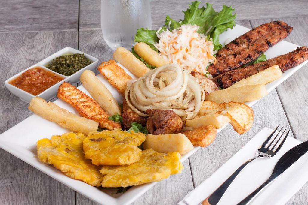Havana Club Platter · Pork Chunks marinated in our special Achiote Sauce, Grilled Sausages, Fried Cheese (2), Thick Cut Cassava Fries and Cabbage Salad