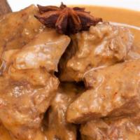 Massaman Curry · Thai style cooked with your choice of meat in massaman curry sauce with onion, sweet potato ...