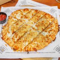 Garlic Cheesy Bread · Extra virgin olive oil, fresh minced garlic, mozzarella, aged Parmesan, Italian herbs, with ...