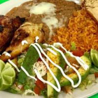 8. Chicken Plate · 2 pieces of chicken with a green salad, rice, beans, and tortillas of your choice.